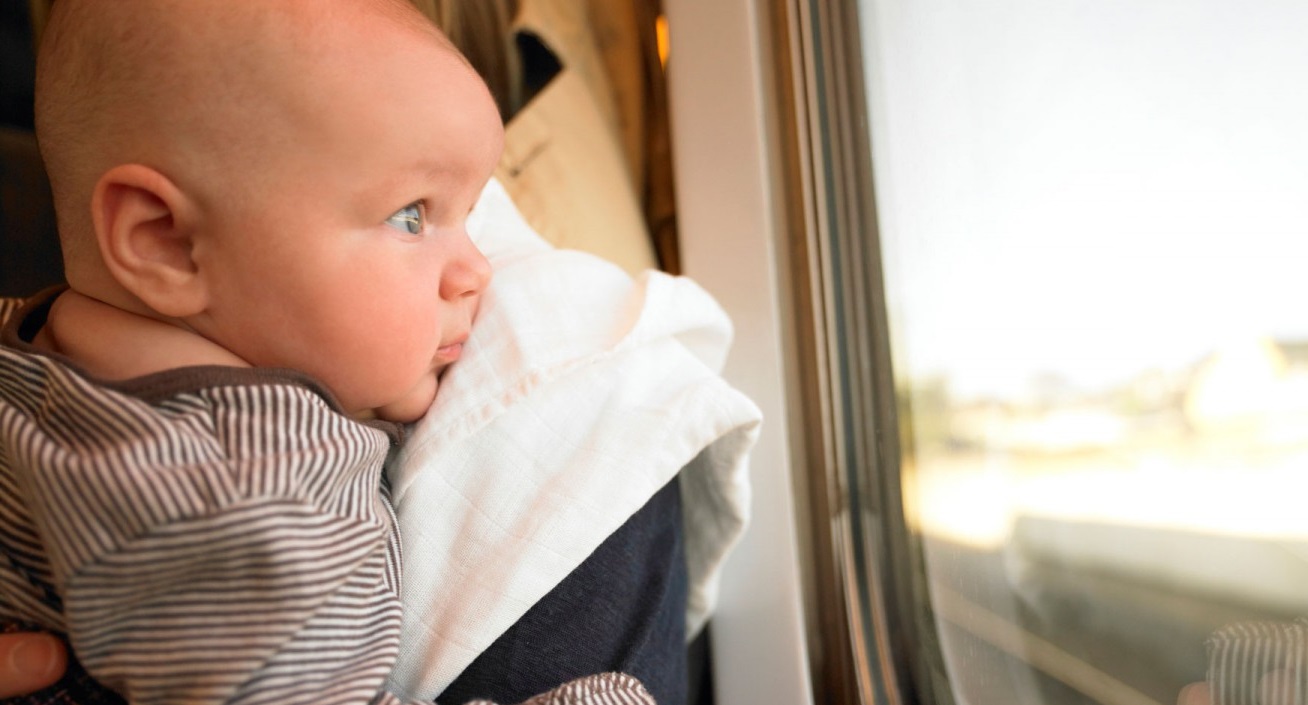 a baby look at the window